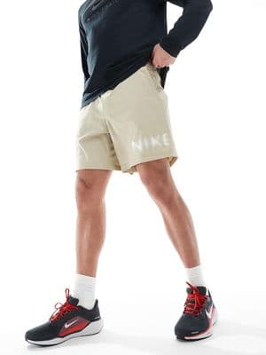 Nike Training blurred swoosh graphic 7 inch shorts
