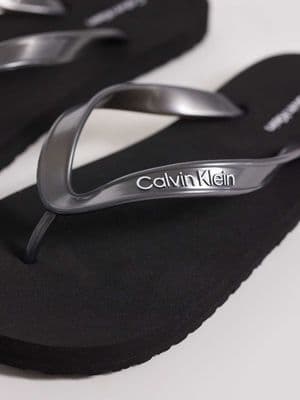 Calvin Klein Jeans metallic flip flops
